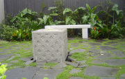 Hand-carved-overflowing-garnite-block